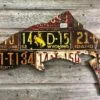 Cody Richardson Art - Antique Mixed Western State Trout License Plate Art
